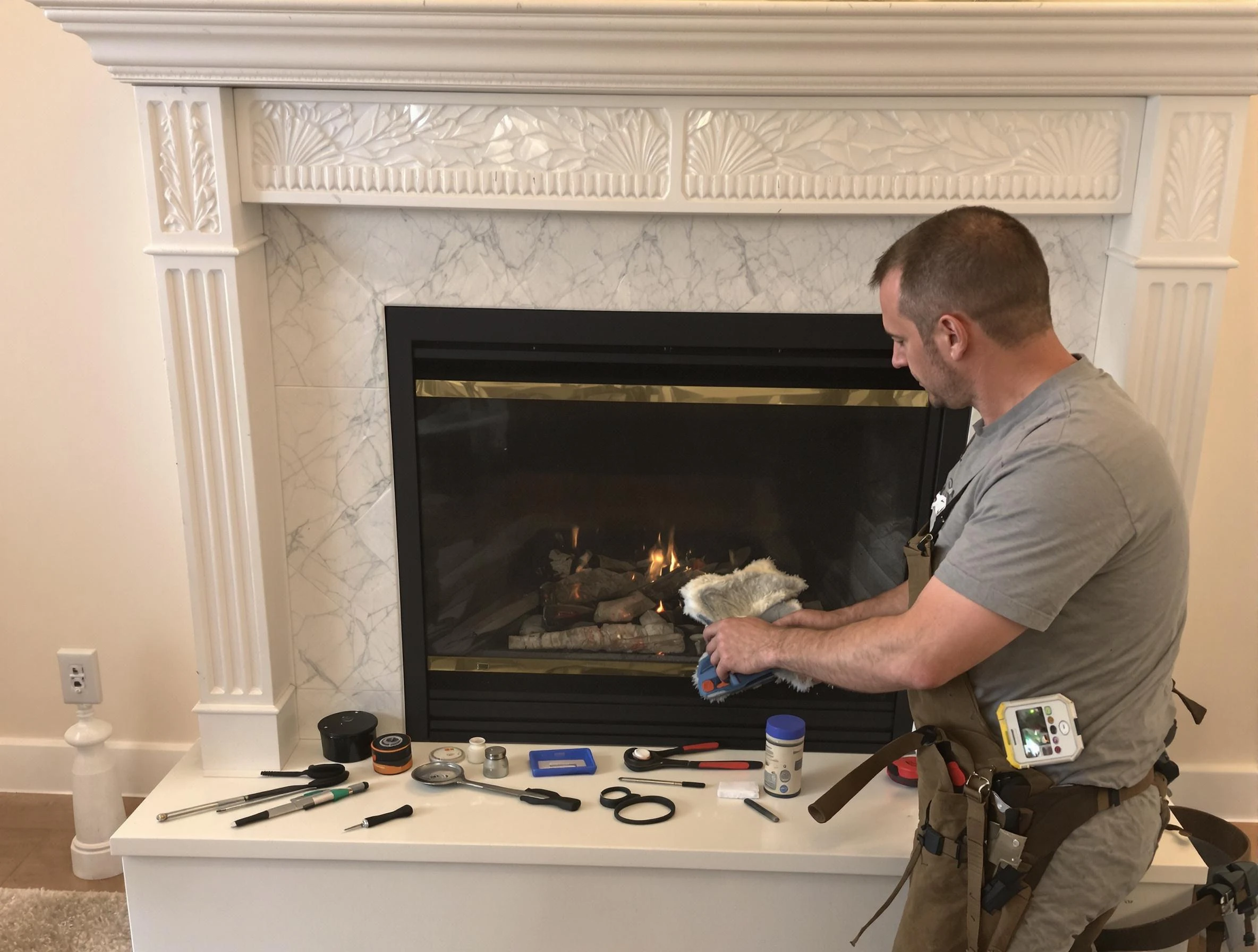 Gloucester Chimney Sweep performing fireplace maintenance in Gloucester, MA